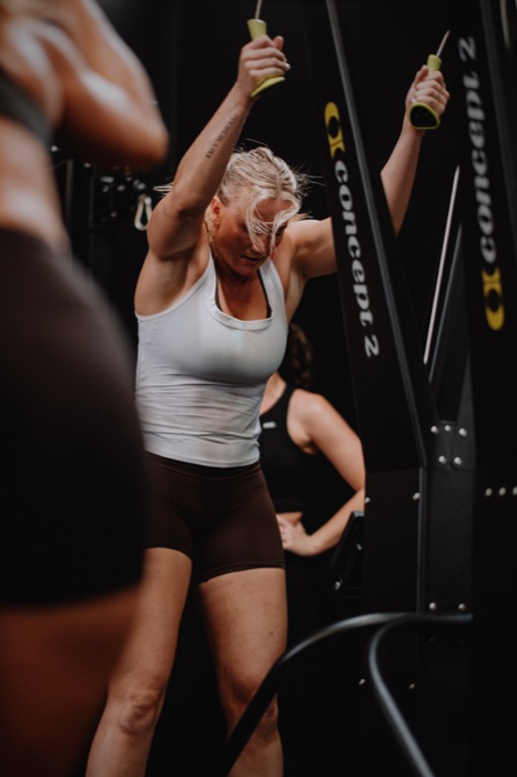 A member mid-set on the ski erg