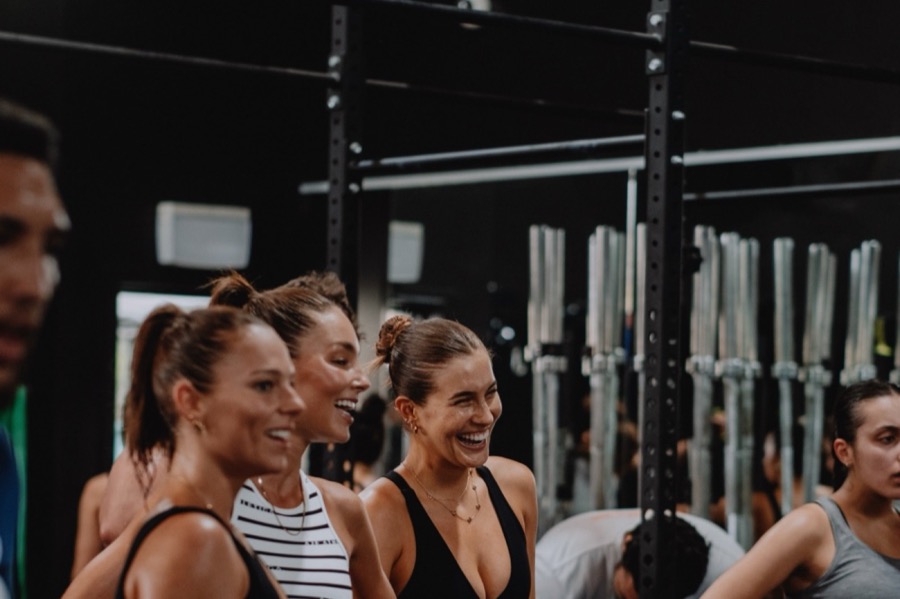 Members laughing together between sets